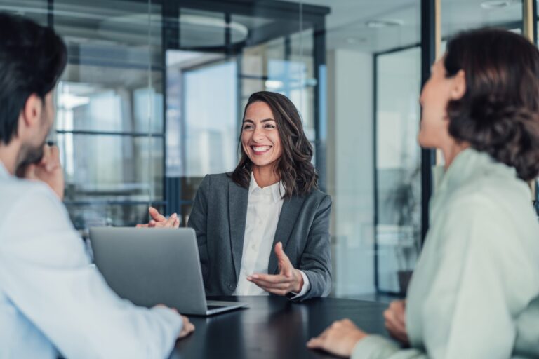 Group of business persons talking in the office